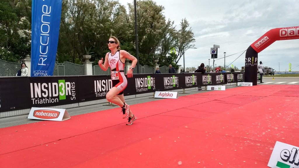 One of the most useful items you might need in a triathlon is a race belt: an elastic belt that you wear around your waist on which you tie the race number. 